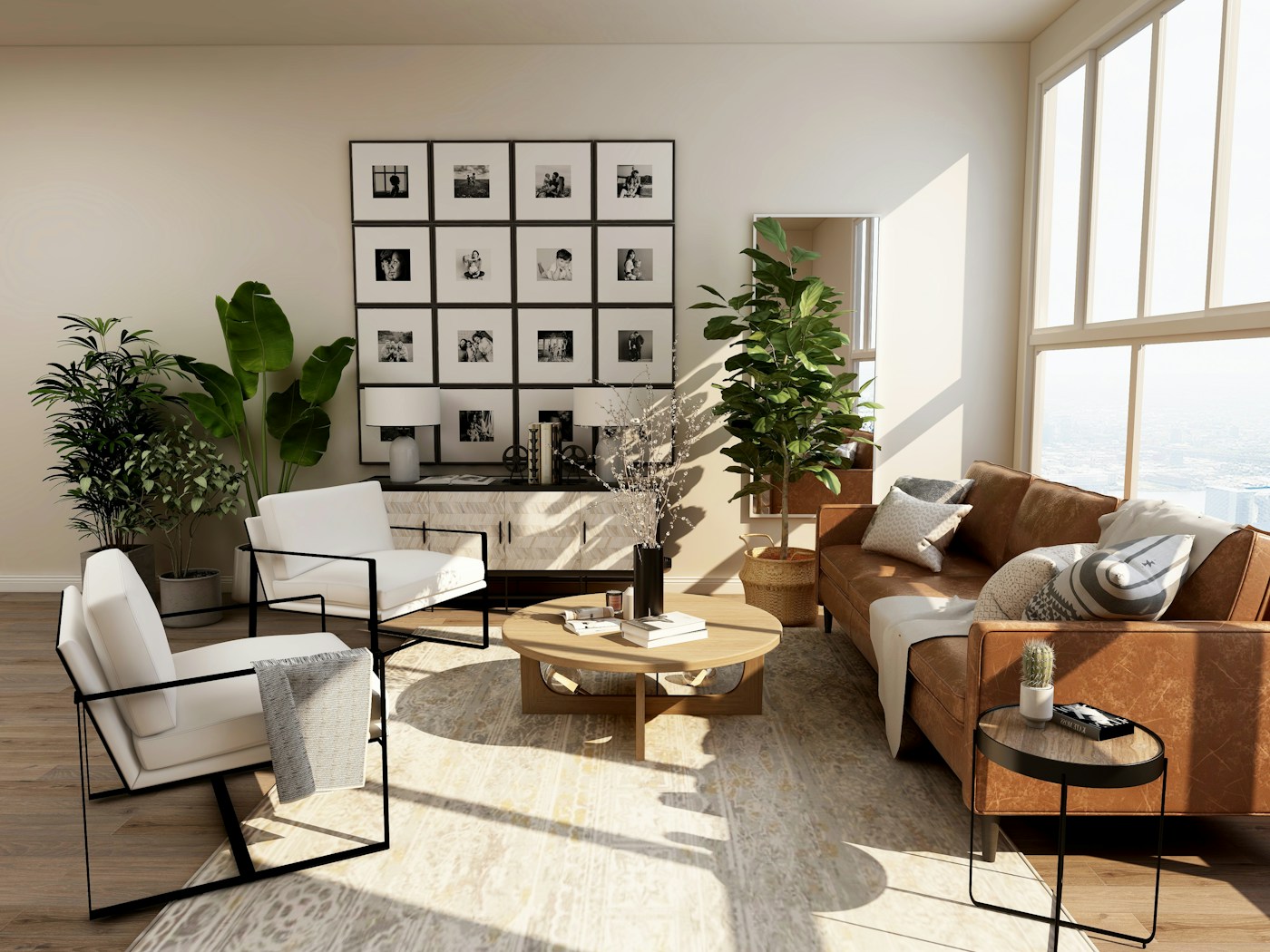 A sunlit living room with large windows, a leather sofa, pale armchairs and indoor plants